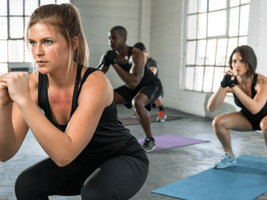 group practicing their squats