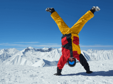 skier doing a handstand