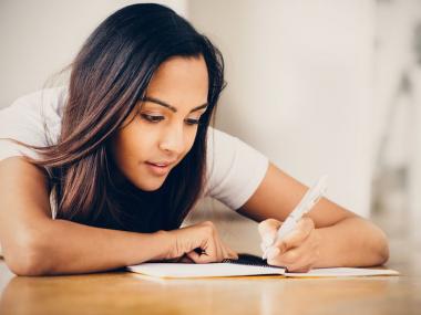 student writing a conclusion