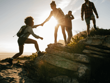 Photo of some hikers on a hill