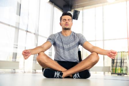 Photo of a man meditating