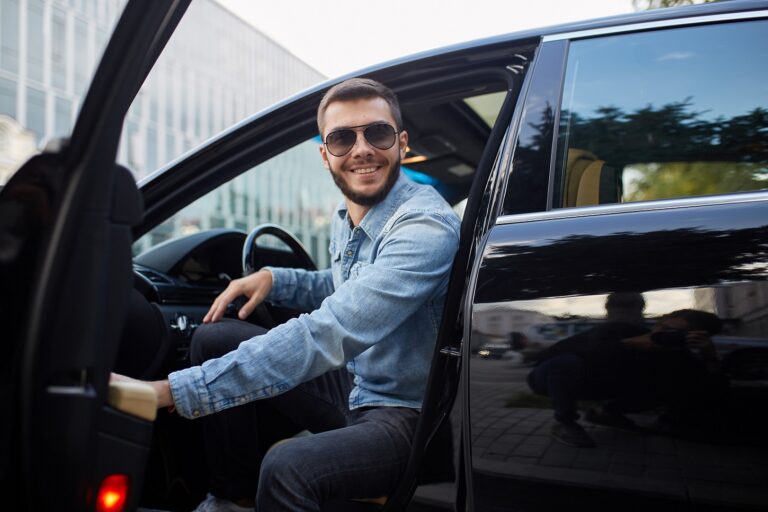 Man getting out of a car